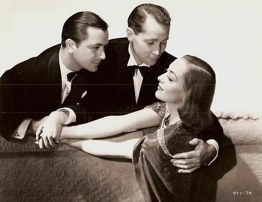 1937. 'Bride Wore Red' publicity, with Robert Young and Franchot Tone.