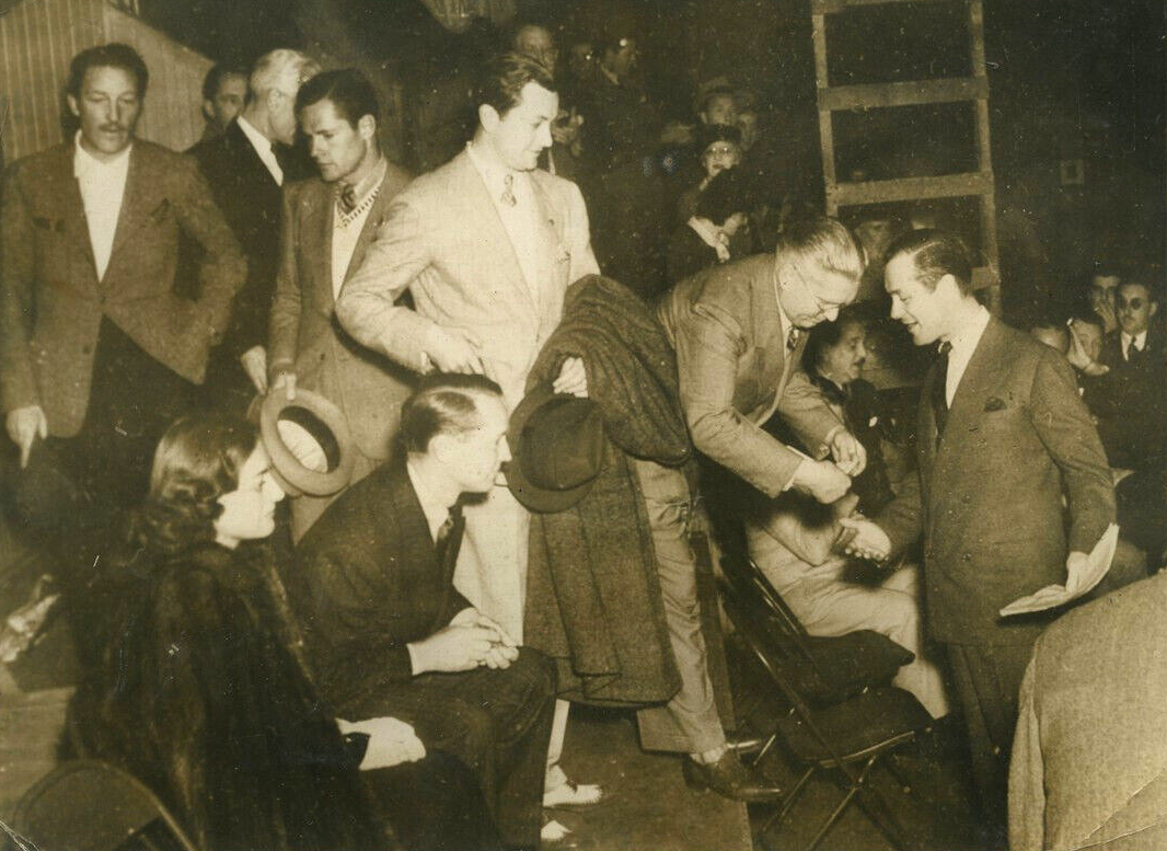 1937. With husband Franchot Tone, Robert Young, Robert Montgomery at a Hollywood strike meeting. (Please send me your translation of the French text!)