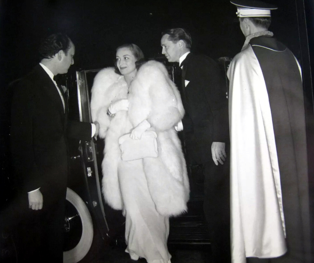 January 1937 at 'Good Earth' premiere with Jerry Asher, left, and husband Franchot Tone.