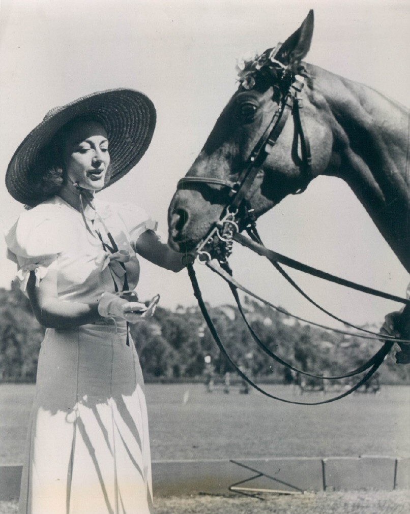 July 1938 with her polo pony 'Secret' at the Will Rogers Memorial Field.