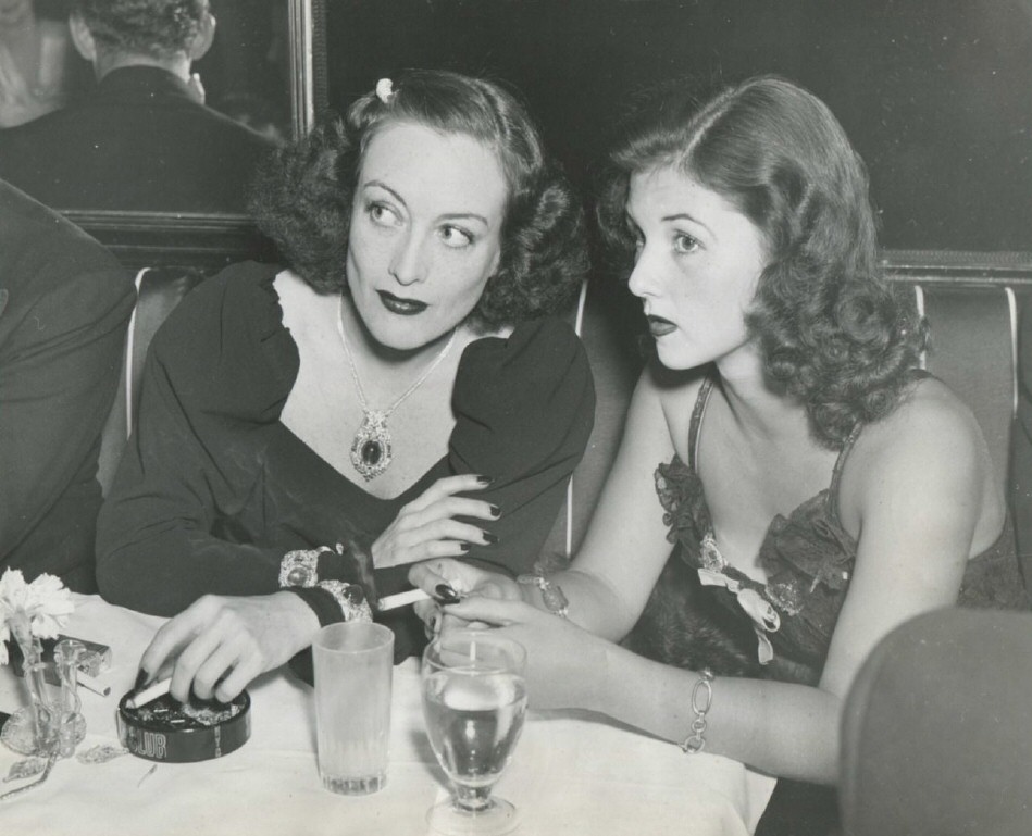 April 1939 at the Stork Club with socialite Brenda Frazier.