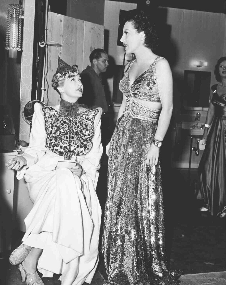 1939. On the set of 'The Women' with Hedda Hopper.