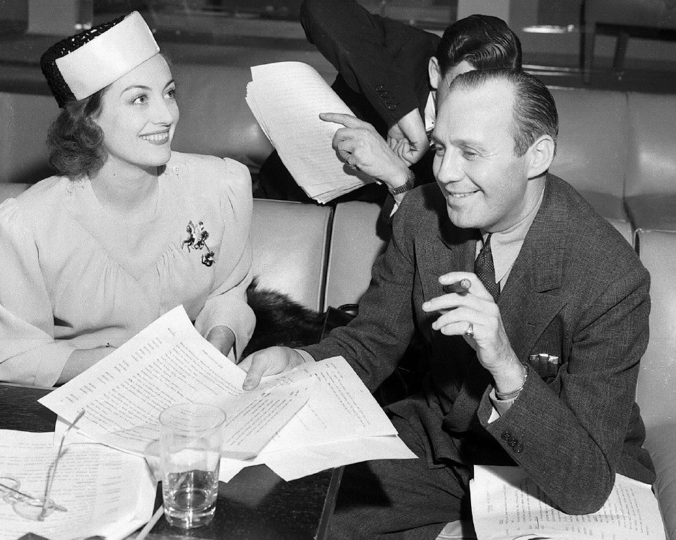 January 1939. With Jack Benny on the set of the CBS radio 'Screen Guild Players' show.