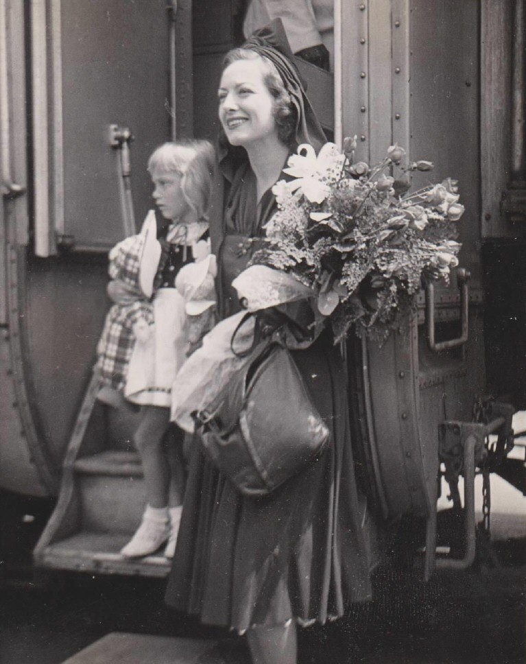 1939. Candid with niece Joanie LeSueur.