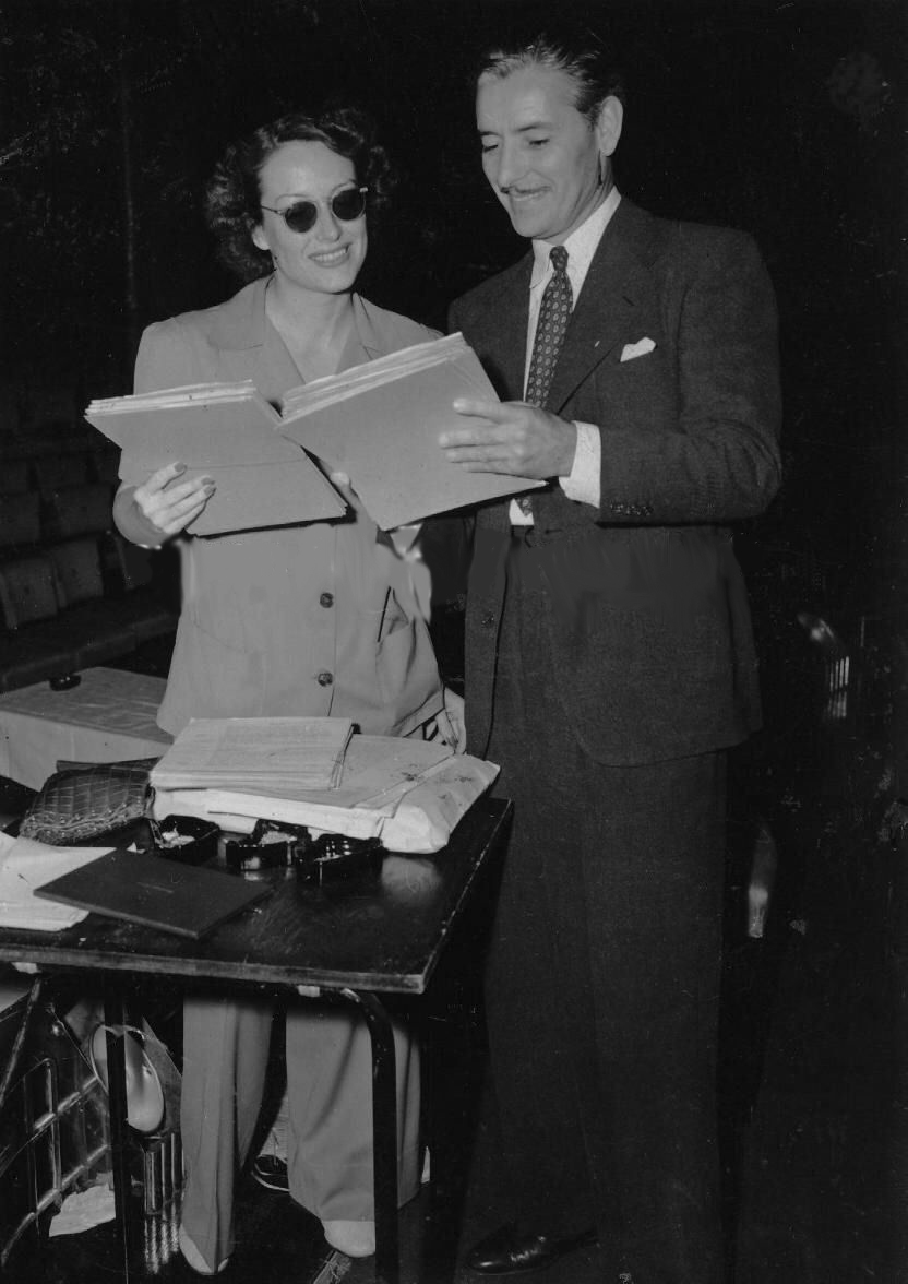 1939. With Ronald Colman on the set of a radio show.