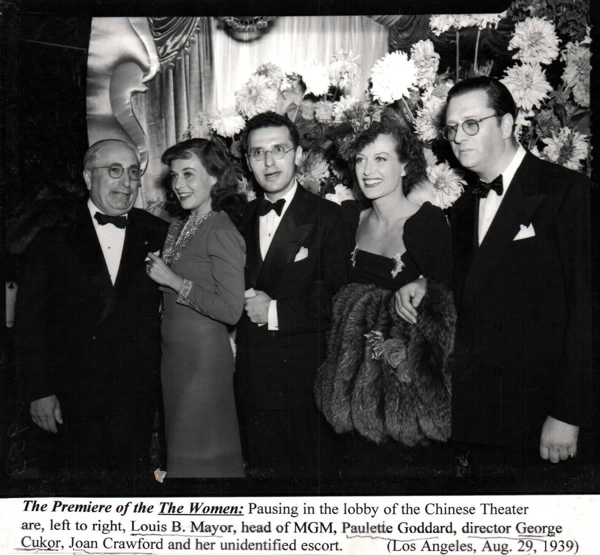 1939. At the premiere of 'The Women' with Mayer, Goddard, Cukor, and Stromberg.