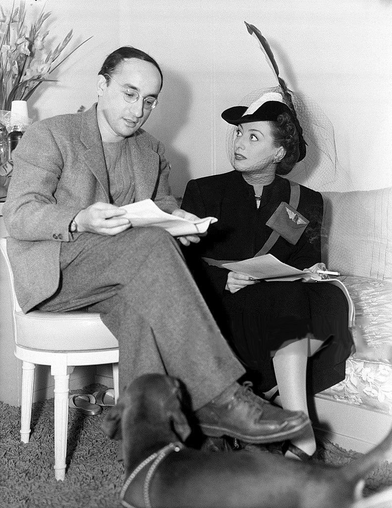 1940. Rehearsing for the 'Arch Oboler's Plays' radio show with playwright Oboler himself.