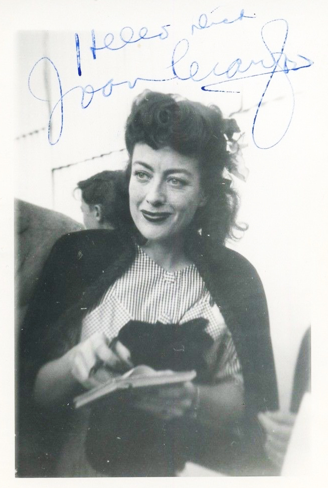 Circa 1944 autographed street candid.