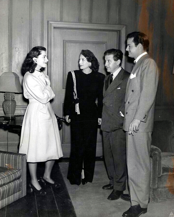 1944. On unknown set with Viveca Lindfors and director Curtis Bernhardt.