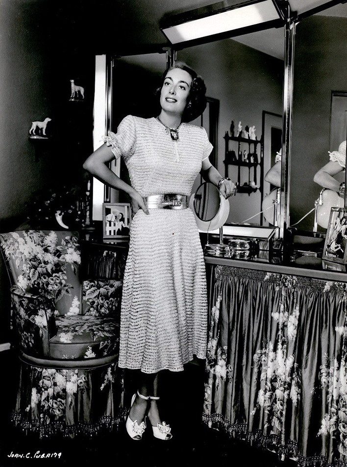 1949 publicity in a dress Joan knitted herself.