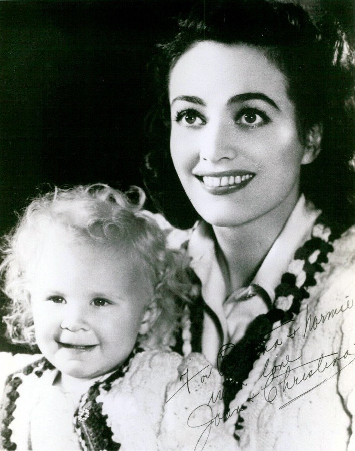 1940. Joan with newly adopted daughter Christina.