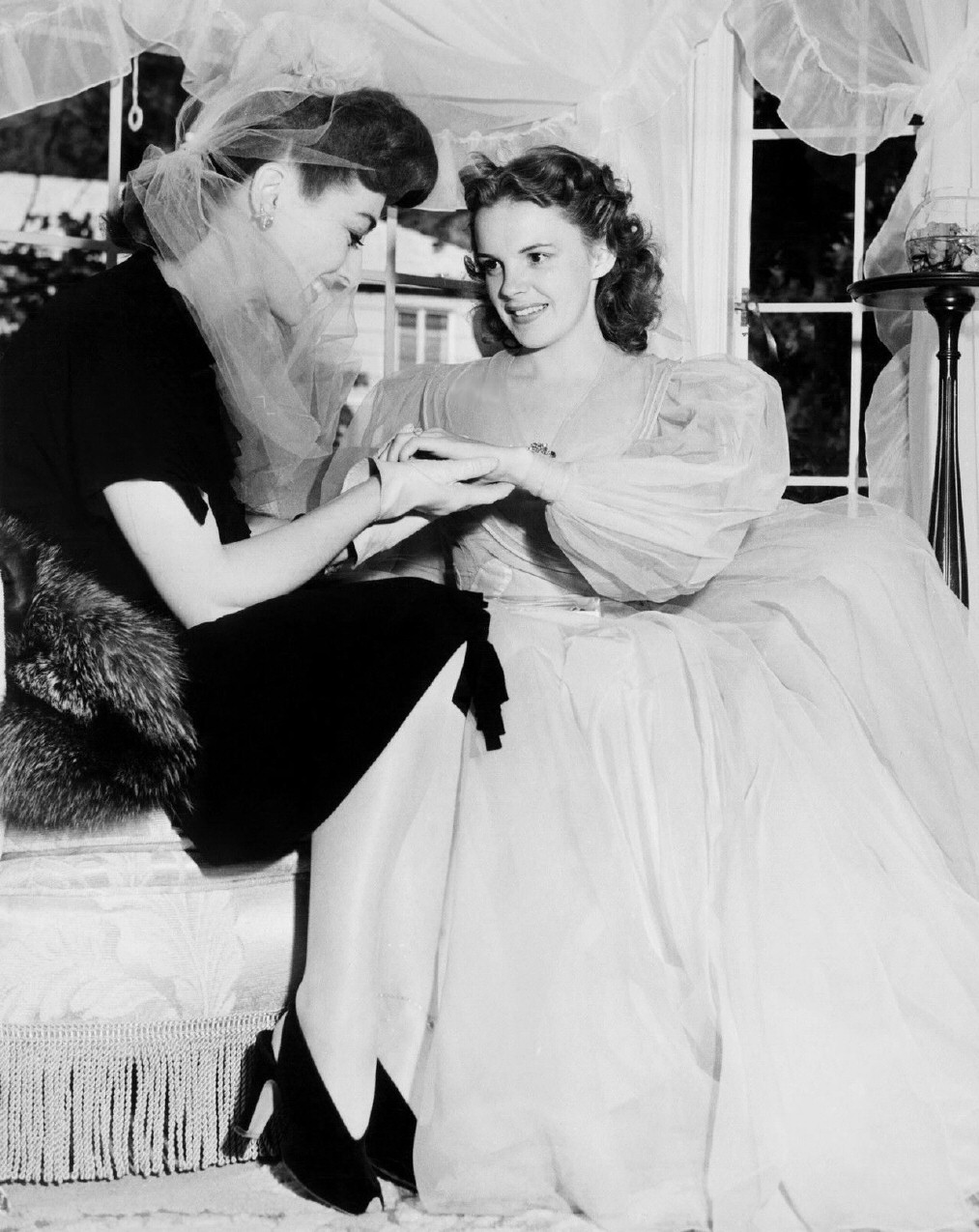 1941. At Judy Garland's bridal shower, admiring engagement ring from David Rose.