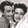 With Robert Taylor.