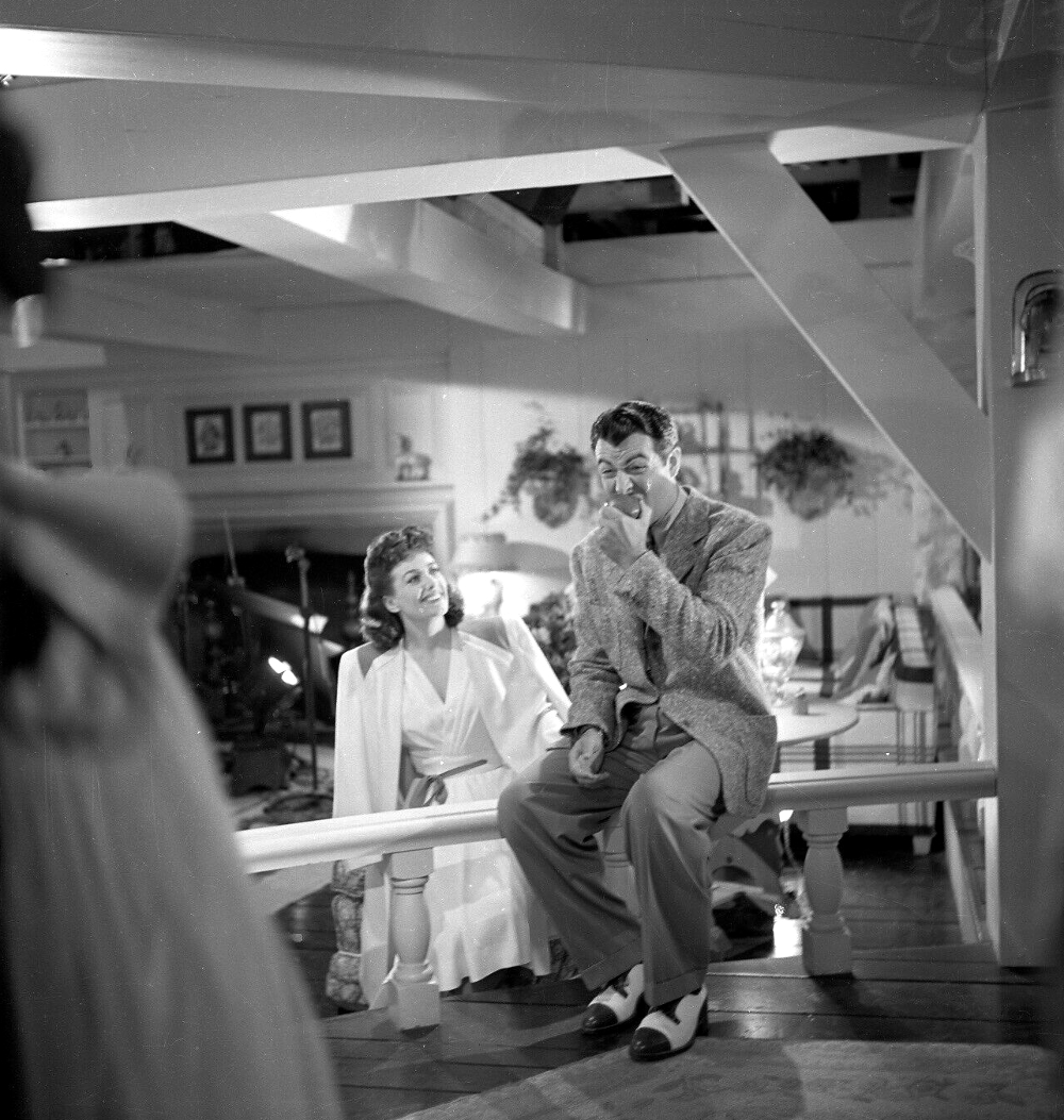 1941. On the set of 'When Ladies Meet' with Robert Taylor.