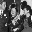 1942. At the Stork Club with Errol Flynn and Louella Parsons.