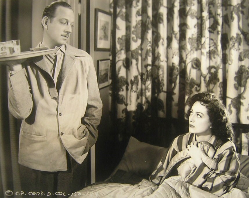 1942. 'They All Kissed the Bride.' With Melvyn Douglas.