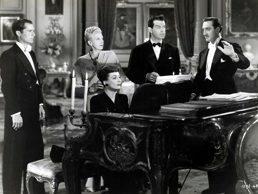 1943. 'Above Suspicion.' With Fred MacMurray (center).
