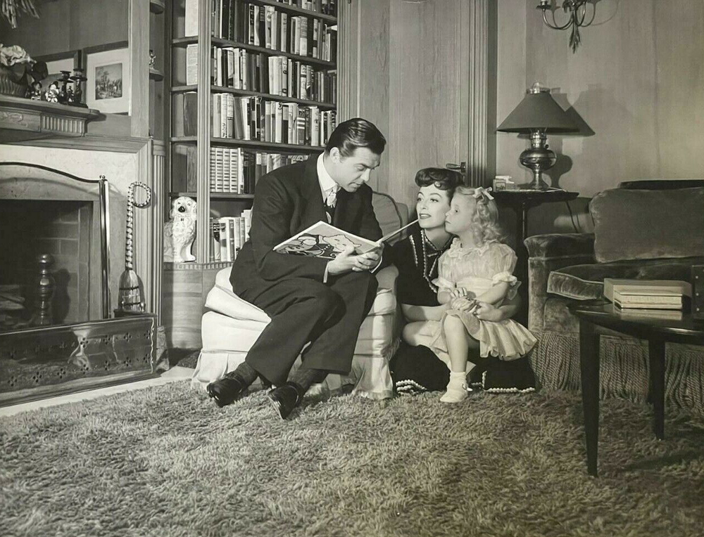 1943. At home with husband Phil Terry and Christina.