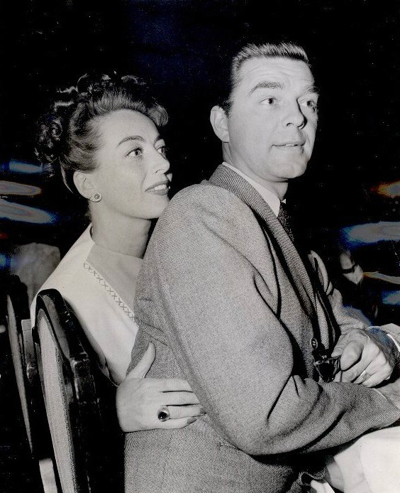 June 1945. With husband Phillip Terry at a fashion show.