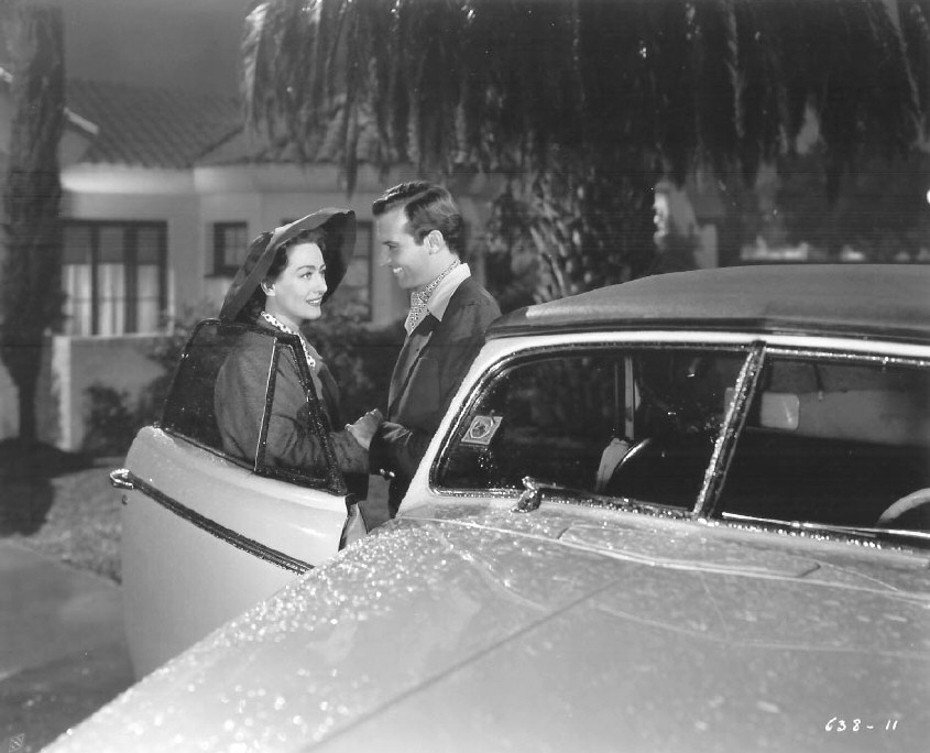 1945. 'Mildred Pierce.' With Zachary Scott.