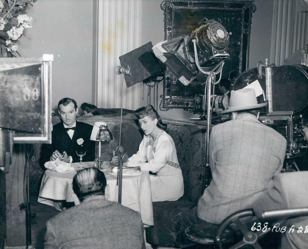 1945. On the set of 'Mildred Pierce' with Zachary Scott.