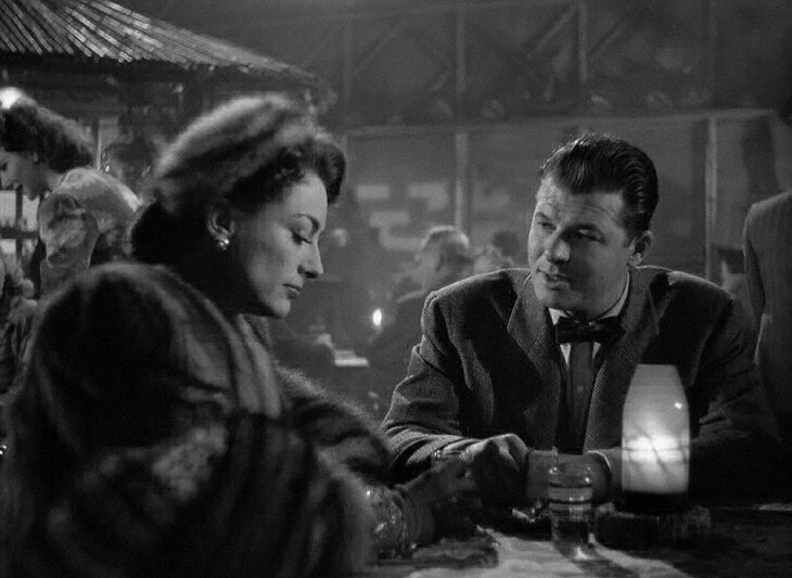 1945. 'Mildred Pierce' screen shot with Jack Carson.