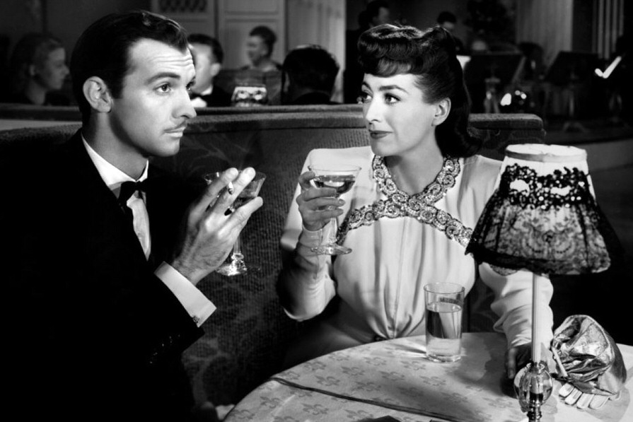 1945. 'Mildred Pierce.' With Zachary Scott.