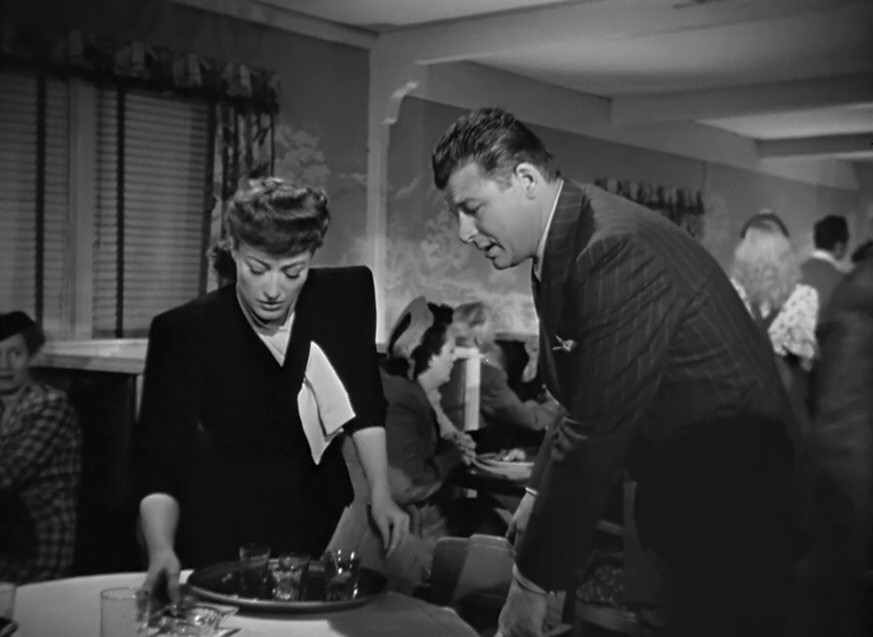 1945. Screen shot from 'Mildred Pierce' with Jack Carson.