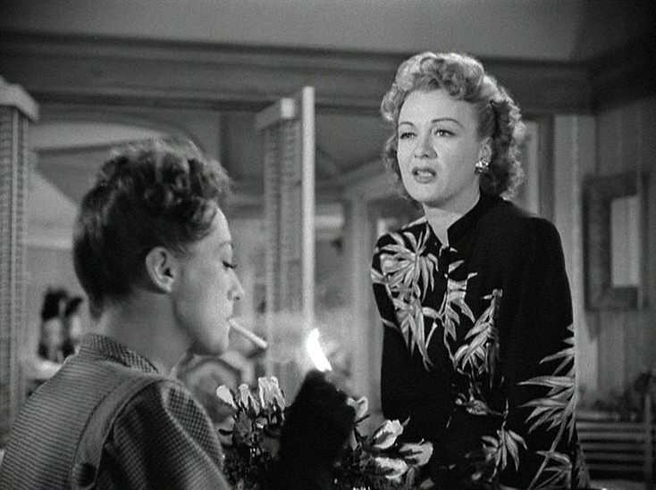 1945. 'Mildred Pierce' screen shot with Eve Arden.