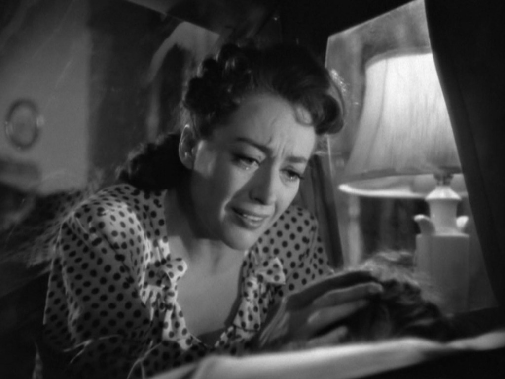 1945. 'Mildred Pierce' screen shot with Jo Ann Marlowe.