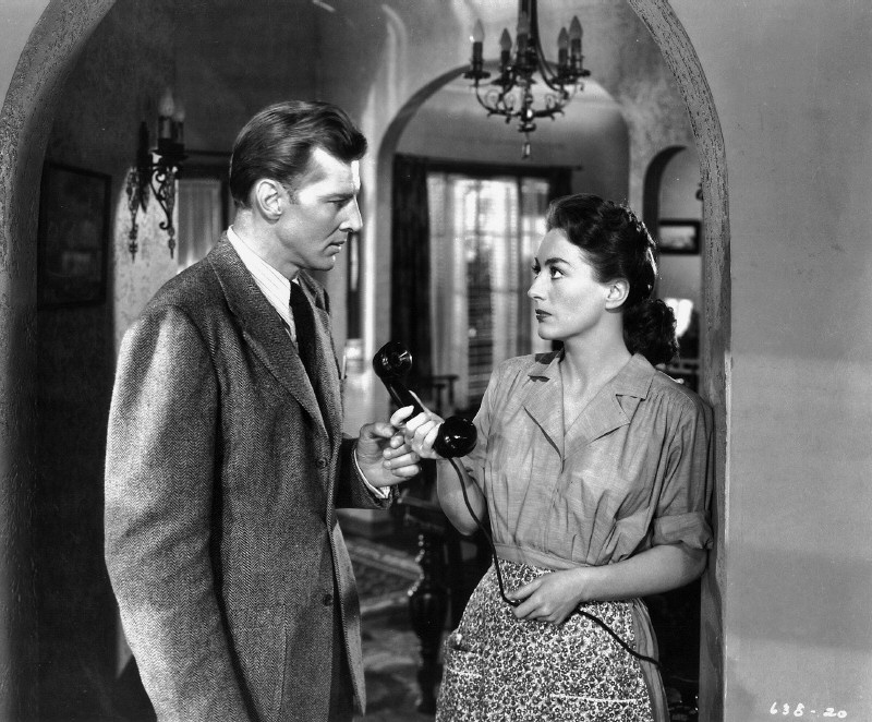 1945. 'Mildred Pierce' film still with Bruce Bennett.