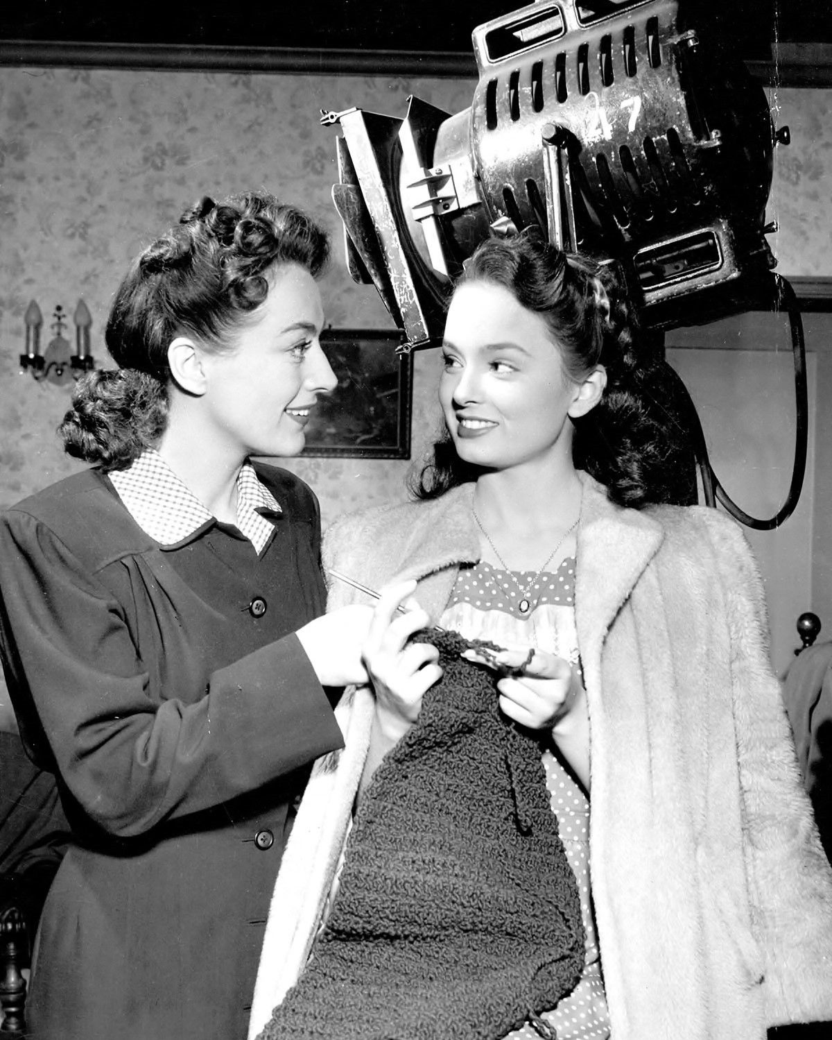 1945. On the set of 'Mildred Pierce' with Ann Blyth.