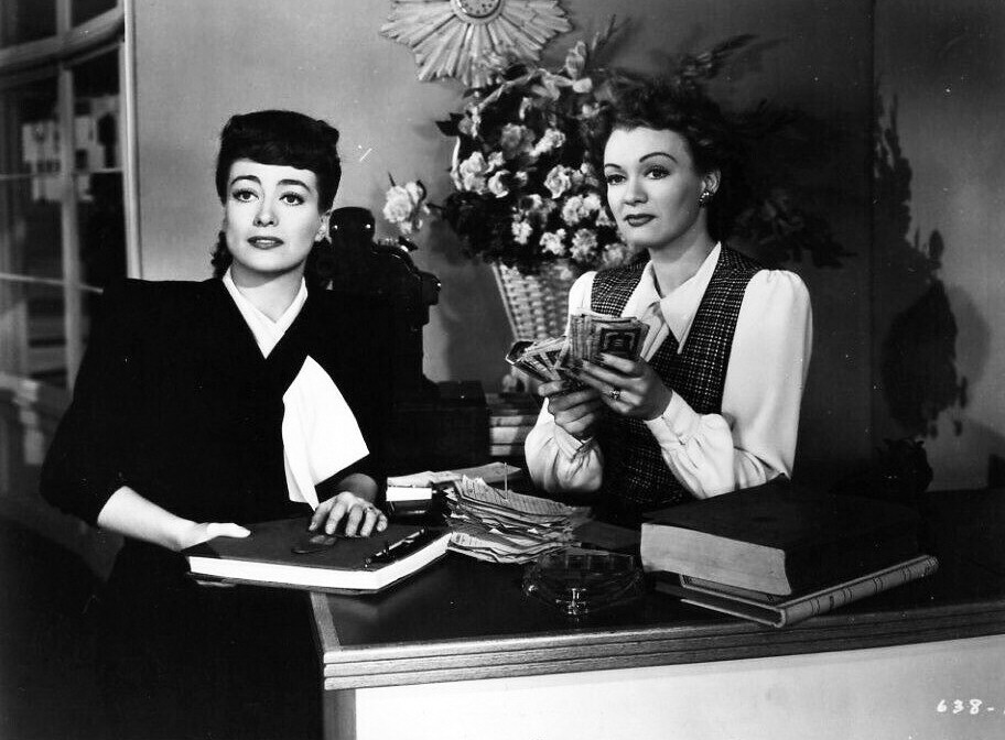 1945. 'Mildred Pierce' still. With Eve Arden.