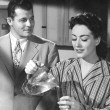 1945. 'Mildred Pierce.' With Jack Carson.
