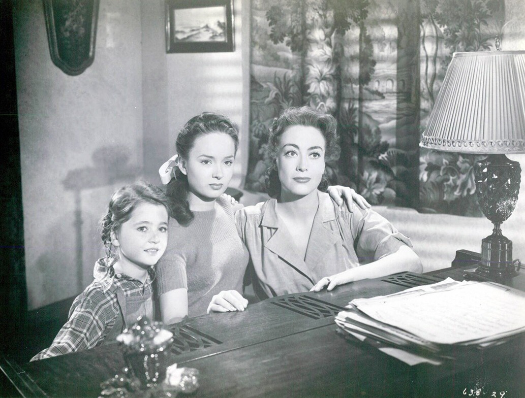 1945. A film still from 'Mildred Pierce' with Jo Ann Marlowe and Ann Blyth.