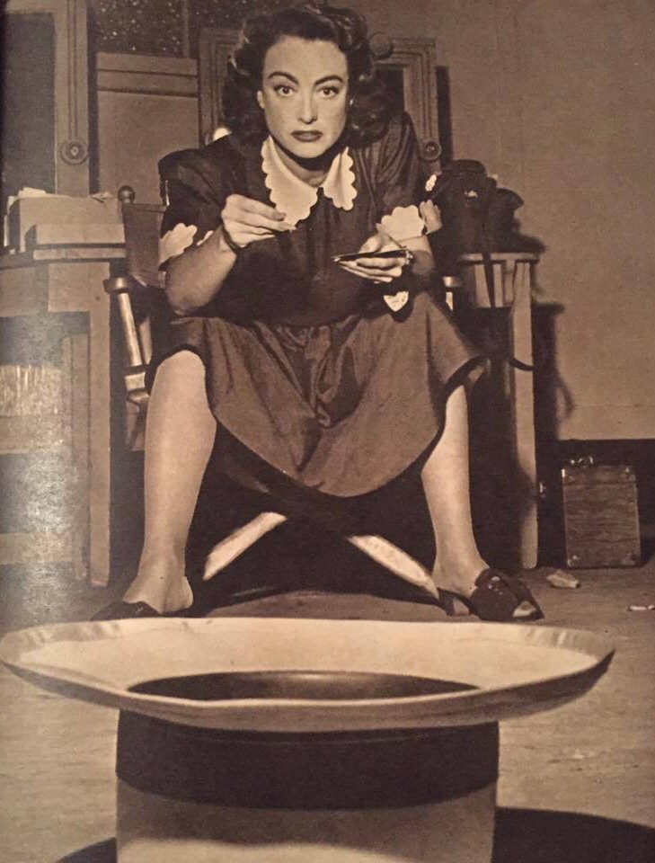 1947. On the set of 'Daisy Kenyon.'