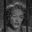 1947. Two 'Possessed' screen shots with rainy window.