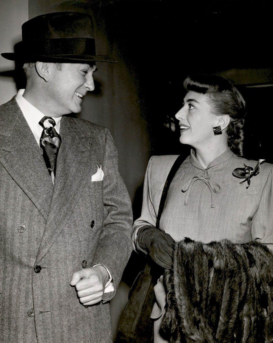 2/20/48. At an LA court with her lawyer for 'Possessed' case.