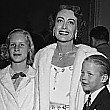 January 1950. At the premiere of the Vince Sherman-directed 'The Hasty Heart,' with Christina and Christopher.