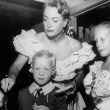 December 1947. At a Beverly Hills toy-store opening with Christopher and Christina.