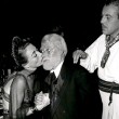 October 1949. Ciro's, Photographers Ball. With George Jessel and Cesar Romero. (Includes press caption.)
