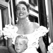 December 1947. At a Beverly Hills toy store opening. With Christopher and Christina.