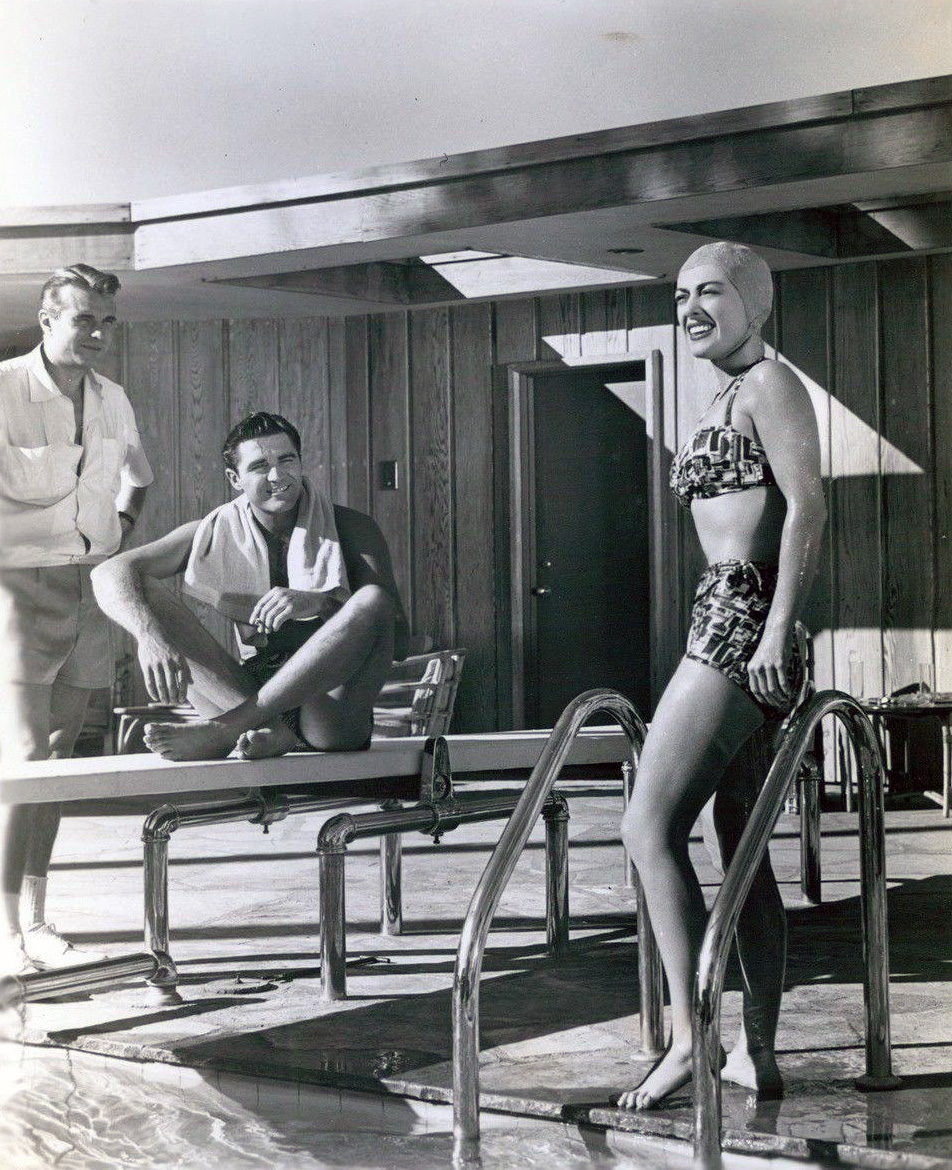 1950. On the set of 'The Damned Don't Cry' with Kent Smith and Steve Cochran.