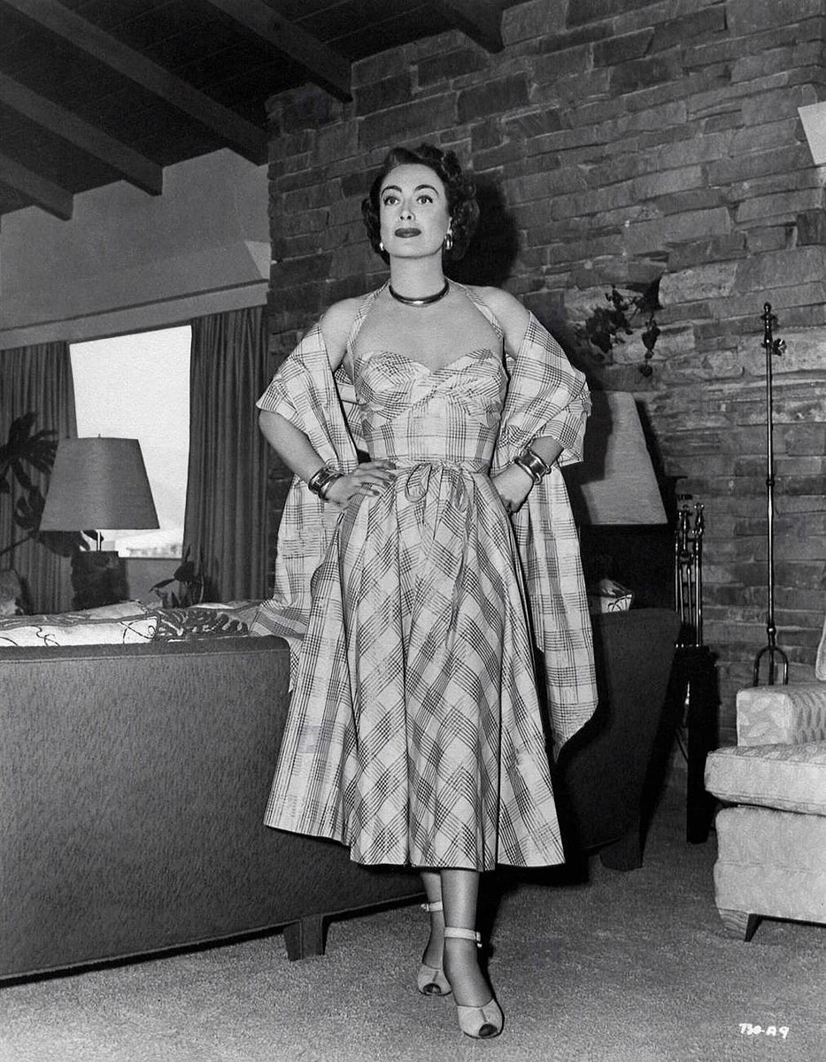 1950. On the set of 'Damned Don't Cry.'