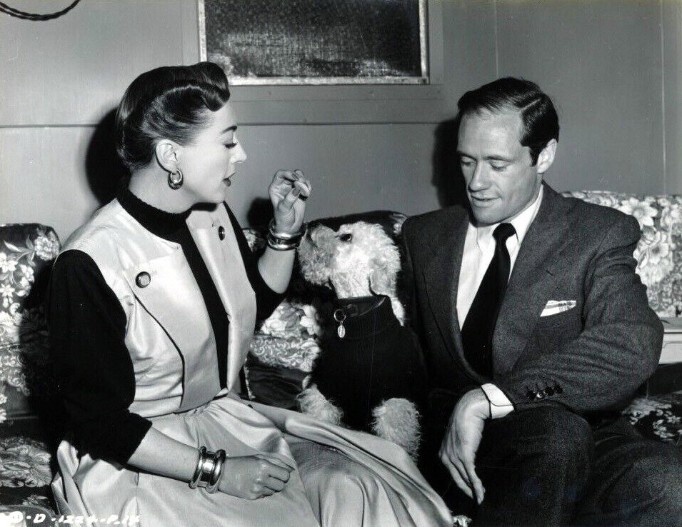 1950. On the 'Harriet Craig' set with Mel Ferrer and Cliquot.