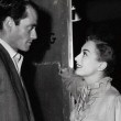 1950. On the set of 'Harriet Craig' with Mel Ferrer (plus press caption).