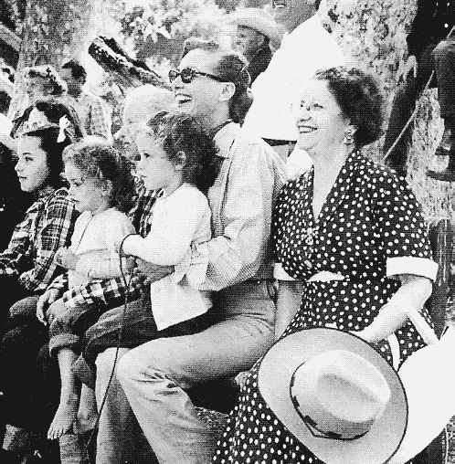 Circa 1951. At unknown event with mother Anna Bell and twins.