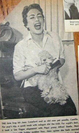 1955. With new puppy Camille.