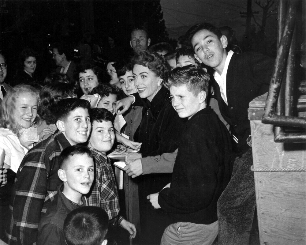 1953, with fans at unknown event.