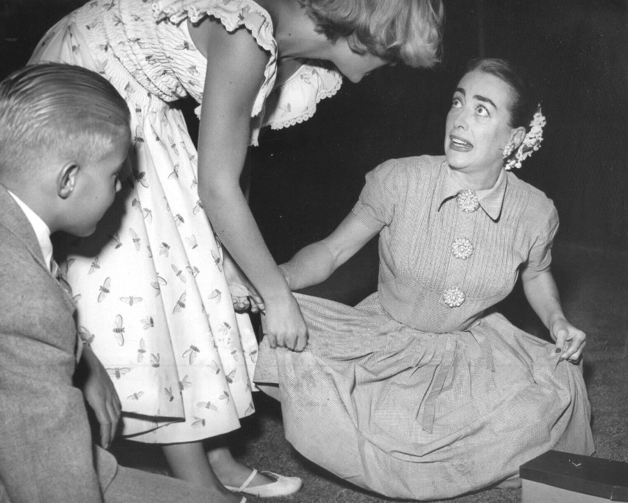 1953. On a frog hunt with Christina and Christopher. Shot by Len Weissman.